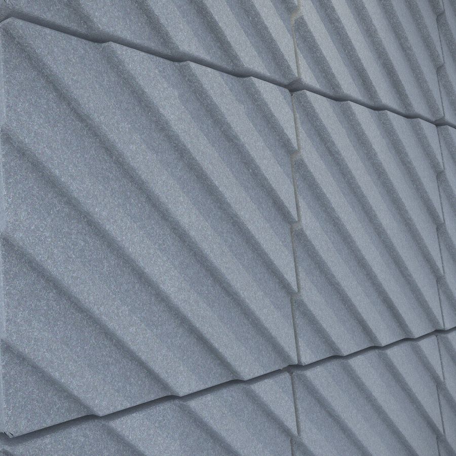 Close up of dark grey Metro acoustic tiles attached to a wall. Acoustic tiles from Acoustek's Newport collection. Sold & manufactured by Acoustek Australia & UK.