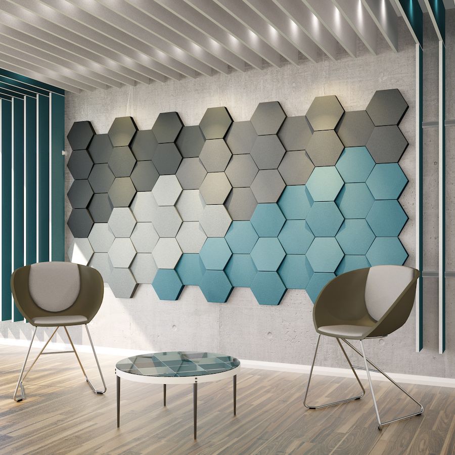 Image of dark grey, light grey & teal blue hexagonal Geo Rapid acoustic panels attached to a wall in an open indoor space. Part of Acoustek's Porto collection. Sold & manufactured by Acoustek Australia & UK.