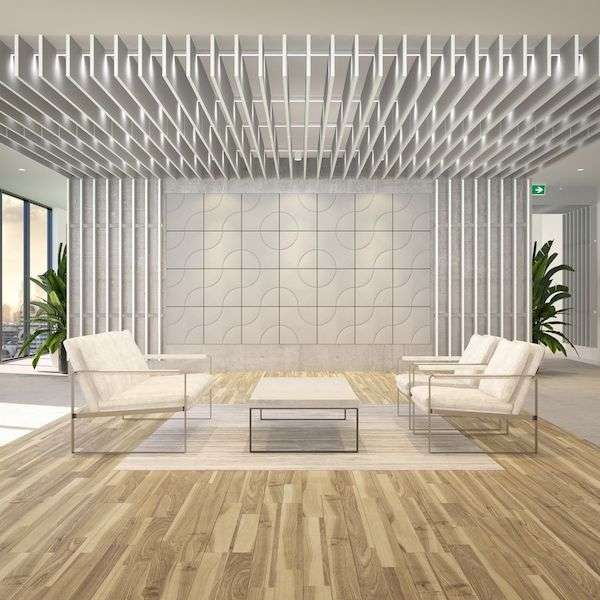 Image of white Acoustek acoustic panels on a wall with acoustic blades attached to the wall and from the ceiling.